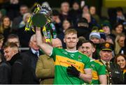 21 January 2024; Alex Doherty of Glen lifts the Andy Merrigan Cup after his side's victory in the AIB GAA Football All-Ireland Senior Club Championship Final match between Glen of Derry and St Brigid's of Roscommon at Croke Park in Dublin. Photo by Ramsey Cardy/Sportsfile