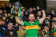 21 January 2024; Conor Glass of Glen lifts the Andy Merrigan Cup after his side's victory in the AIB GAA Football All-Ireland Senior Club Championship Final match between Glen of Derry and St Brigid's of Roscommon at Croke Park in Dublin. Photo by Ramsey Cardy/Sportsfile