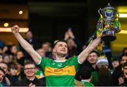 21 January 2024; Stevie O'Hara of Glen lifts the Andy Merrigan Cup after his side's victory in the AIB GAA Football All-Ireland Senior Club Championship Final match between Glen of Derry and St Brigid's of Roscommon at Croke Park in Dublin. Photo by Ramsey Cardy/Sportsfile