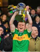 21 January 2024; Conor Convery of Glen lifts the Andy Merrigan Cup after his side's victory in the AIB GAA Football All-Ireland Senior Club Championship Final match between Glen of Derry and St Brigid's of Roscommon at Croke Park in Dublin. Photo by Ramsey Cardy/Sportsfile