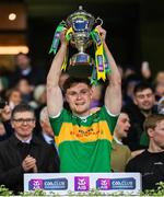 21 January 2024; Ethan Doherty of Glen lifts the Andy Merrigan Cup after his side's victory in the AIB GAA Football All-Ireland Senior Club Championship Final match between Glen of Derry and St Brigid's of Roscommon at Croke Park in Dublin. Photo by Ramsey Cardy/Sportsfile