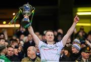 21 January 2024; Connlan Bradley of Glen lifts the Andy Merrigan Cup after his side's victory in the AIB GAA Football All-Ireland Senior Club Championship Final match between Glen of Derry and St Brigid's of Roscommon at Croke Park in Dublin. Photo by Ramsey Cardy/Sportsfile