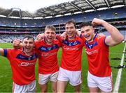 21 January 2024; St Thomas' players, from left, Damien Finnerty, Cian Mahony, Conor Cooney and John Headd celebrate after their side's victory in the AIB GAA Hurling All-Ireland Senior Club Championship Final match between O’Loughlin Gaels of Kilkenny and St. Thomas’ of Galway at Croke Park in Dublin. Photo by Piaras Ó Mídheach/Sportsfile