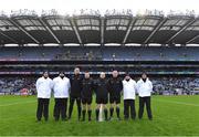 21 January 2024; Referee Brendan Cawley with his match officials before the AIB GAA Football All-Ireland Senior Club Championship Final match between Glen of Derry and St Brigid's of Roscommon at Croke Park in Dublin. Photo by Piaras Ó Mídheach/Sportsfile