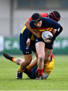 23 January 2024; Benjamin Griffiths of Temple Carrig is tackled by Ponamu Palazzetti of St Fintan's during the Bank of Ireland Leinster Rugby Schools Vinnie Murray Cup semi-final match between Temple Carrig School and St Fintan’s High School at Energia Park in Dublin. Photo by Tyler Miller/Sportsfile