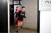 20 January 2024; Derry captain Shane McGuigan leads his side out before the Bank of Ireland Dr McKenna Cup final match between Derry and Donegal at O'Neills Healy Park in Omagh, Tyrone. Photo by Ramsey Cardy/Sportsfile