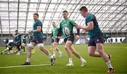 23 January 2024; Sam Prendergast, centre, during Ireland Rugby squad training at the IRFU High Performance Centre at the Sport Ireland Campus in Dublin. Photo by Harry Murphy/Sportsfile