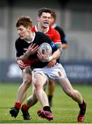 23 January 2024; Evan Kelleher of The High School is tackled by Finn Walsh of CUS during the Bank of Ireland Leinster Rugby Schools Vinnie Murray Cup semi-final match between High School and CUS at Energia Park in Dublin. Photo by Tyler Miller/Sportsfile
