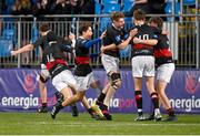 23 January 2024; Alex Bowden of The High School, second from right, celebrates with team-mates after his side take the lead in the 70th minute during the Bank of Ireland Leinster Rugby Schools Vinnie Murray Cup semi-final match between High School and CUS at Energia Park in Dublin. Photo by Tyler Miller/Sportsfile
