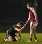 23 January 2024; Colin Murray of University of Galway consoles Killian Burke of St Mary's University after  the Electric Ireland Higher Education GAA Sigerson Cup Round 3 match between University of Galway and St Mary's University College at GAA National Games Development Centre in Abbotstown, Dublin. Photo by Brendan Moran/Sportsfile
