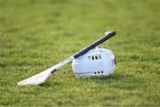 24 January 2024; A hurling helmet and a hurl after the Electric Ireland Higher Education GAA Fitzgibbon Cup Round 2 match between Mary Immaculate College Limerick and UCC at MICL Grounds in Limerick. Photo by Piaras Ó Mídheach/Sportsfile