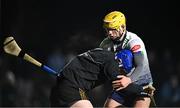 24 January 2024; TUS Midwest goalkeeper Enda Dunphy is tackled by Mark Rogers of UL during the Electric Ireland Higher Education GAA Fitzgibbon Cup Round 2 match between University of Limerick and TUS Midwest at UL Grounds in Limerick. Photo by Piaras Ó Mídheach/Sportsfile