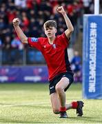 25 January 2024; Lachlan Honan of CUS celebrates after scoring his side's second try during the Bank of Ireland Leinster Rugby Schools Father Godfrey Cup semi-final match between Good Counsel, New Ross and CUS at Energia Park in Dublin. Photo by Ben McShane/Sportsfile