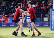 25 January 2024; Lachlan Honan of CUS celebrates with teammate David Ginnelly, left, after scoring their side's second try during the Bank of Ireland Leinster Rugby Schools Father Godfrey Cup semi-final match between Good Counsel, New Ross and CUS at Energia Park in Dublin. Photo by Ben McShane/Sportsfile