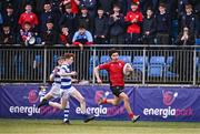 25 January 2024; Mark Murray of CUS makes a break on his way to scoring his side's third try during the Bank of Ireland Leinster Rugby Schools Father Godfrey Cup semi-final match between Good Counsel, New Ross and CUS at Energia Park in Dublin. Photo by Ben McShane/Sportsfile