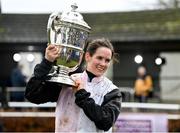 25 January 2024; Jockey Rachael Blackmore celebrates with the trophy after riding Ain't That A Shame to victory in the Goffs Thyestes Handicap Steeplechase at Gowran Park in Kilkenny. Photo by Seb Daly/Sportsfile