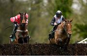 25 January 2024; Ain't That A Shame, right, with Rachael Blackmore up, jumps the last on their way to winning the Goffs Thyestes Handicap Steeplechase, from second place Glengouly, left, with Paul Townend up, at Gowran Park in Kilkenny. Photo by Seb Daly/Sportsfile