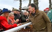 25 January 2024; Trainer Henry de Bromhead is congratulated by a racegoer after sending out Ain't That A Shame to win the Goffs Thyestes Handicap Steeplechase at Gowran Park in Kilkenny. Photo by Seb Daly/Sportsfile