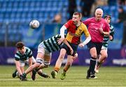 25 January 2024; Eoin Garvey of St Fintan's High School offloads a pass despite the tackle of Kelly Luke of St Gerard's School during the Bank of Ireland Leinster Rugby Schools Father Godfrey Cup semi-final match between St Gerard's School and St Fintan's High School at Energia Park in Dublin. Photo by Ben McShane/Sportsfile