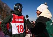 27 January 2024; Thomas Dooley of Team Ireland speaks to Team Ireland head of communications Heather Boyle after competing in the mens dual moguls event during day eight of the Winter Youth Olympic Games 2024 at Gangwon in South Korea. Photo by Eóin Noonan/Sportsfile