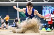 27 January 2024; Charlie Sands of Ardee and District AC, Louth, competes in the long jump of the 16-17 boys combined events during day one of the AAI Games & 123.ie National Indoor Combined Events at the National Indoor Arena in Dublin. Photo by Sam Barnes/Sportsfile