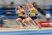 27 January 2024; Caitlin Maguire of North Belfast Harriers, right, competes in the women's 60m during day one of the AAI Games & 123.ie National Indoor Combined Events at the National Indoor Arena in Dublin. Photo by Sam Barnes/Sportsfile