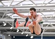 27 January 2024; Colm Bourke of Raheny Shamrock AC, Dublin, competes in the men's long jump during day one of the AAI Games & 123.ie National Indoor Combined Events at the National Indoor Arena in Dublin. Photo by Sam Barnes/Sportsfile