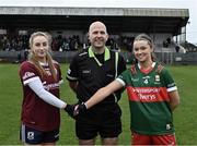 27 January 2024; Referee Kevin Phelan with team captains Ailbhe Davoren of Galway and Saoirse Lally of Mayo before the Lidl LGFA National League Division 1 Round 2 match between Galway and Mayo at Duggan Park in Ballinasloe, Galway. Photo by Piaras Ó Mídheach/Sportsfile