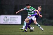 27 January 2024; Josh Honohan of Shamrock Rovers and Mark Hanratty of Wexford during the pre-season friendly match between Shamrock Rovers and Wexford at Roadstone Group Sports Club in Dublin. Photo by Stephen McCarthy/Sportsfile