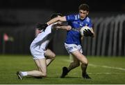 27 January 2024; Ciarán Brady of Cavan in action against Kevin Flynn of Kildare during the Allianz Football League Division 2 match between Kildare and Cavan at Netwatch Cullen Park in Carlow. Photo by David Fitzgerald/Sportsfile