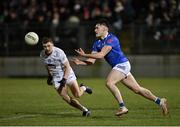 27 January 2024; Oisin Kiernan of Cavan in action against Paddy Woodgate of Kildare during the Allianz Football League Division 2 match between Kildare and Cavan at Netwatch Cullen Park in Carlow. Photo by Stephen Marken/Sportsfile