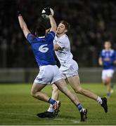 27 January 2024; Kevin Feely of Kildare in action against Niall Carolan of Cavan during the Allianz Football League Division 2 match between Kildare and Cavan at Netwatch Cullen Park in Carlow. Photo by David Fitzgerald/Sportsfile