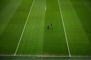 27 January 2024; Staff examine the pitch before the Allianz Football League Division 1 match between Dublin and Monaghan at Croke Park in Dublin. Photo by Ray McManus/Sportsfile
