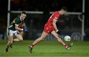 27 January 2024; Shane McGuigan of Derry in action against Jason Foley of Kerry during the Allianz Football League Division 1 match between Kerry and Derry at Austin Stack Park in Tralee, Kerry. Photo by Brendan Moran/Sportsfile