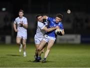 27 January 2024; Ciarán Brady of Cavan in action against Ryan Houlihan of Kildare during the Allianz Football League Division 2 match between Kildare and Cavan at Netwatch Cullen Park in Carlow. Photo by Stephen Marken/Sportsfile