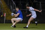 27 January 2024; Paddy Lynch of Cavan in action against Shea Ryan of Kildare during the Allianz Football League Division 2 match between Kildare and Cavan at Netwatch Cullen Park in Carlow. Photo by Stephen Marken/Sportsfile