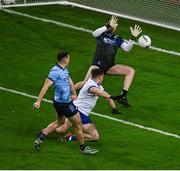 27 January 2024; Cormac Costello of Dublin shoots past Ryan Wylie and Monaghan goalkeeper Darren McDonnell to score a goal, in the 4th minute, during the Allianz Football League Division 1 match between Dublin and Monaghan at Croke Park in Dublin. Photo by Ray McManus/Sportsfile