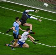 27 January 2024; Cormac Costello of Dublin shoots past Ryan Wylie and Monaghan goalkeeper Darren McDonnell to score a goal, in the 4th minute, during the Allianz Football League Division 1 match between Dublin and Monaghan at Croke Park in Dublin. Photo by Ray McManus/Sportsfile