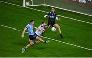 27 January 2024; Cormac Costello of Dublin shoots past Ryan Wylie and Monaghan goalkeeper Darren McDonnell to score a goal, in the 4th minute, during the Allianz Football League Division 1 match between Dublin and Monaghan at Croke Park in Dublin. Photo by Ray McManus/Sportsfile