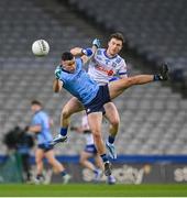 27 January 2024; Ross McGarry of Dublin in action against Killian Lavelle of Monaghan during the Allianz Football League Division 1 match between Dublin and Monaghan at Croke Park in Dublin. Photo by Seb Daly/Sportsfile