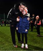 27 January 2024; Armagh manager Kieran McGeeney with his daughter Leah, age 9, after his sides victory in the Allianz Football League Division 2 match between Armagh and Louth at BOX-IT Athletic Grounds in Armagh. Photo by Ben McShane/Sportsfile
