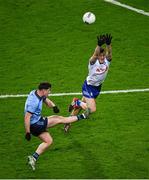 27 January 2024; Luke Breathnach of Dublin in action against Ryan Wylie of Monaghan during the Allianz Football League Division 1 match between Dublin and Monaghan at Croke Park in Dublin. Photo by Ray McManus/Sportsfile