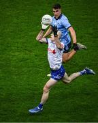 27 January 2024; Kevin Loughran of Monaghan in action against Lorcan O'Dell of Dublin during the Allianz Football League Division 1 match between Dublin and Monaghan at Croke Park in Dublin. Photo by Ray McManus/Sportsfile