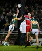 27 January 2024; Christopher McKaigue of Derry blocks a goalbound effort from Sean O'Shea of Kerry during the Allianz Football League Division 1 match between Kerry and Derry at Austin Stack Park in Tralee, Kerry. Photo by Brendan Moran/Sportsfile