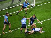 27 January 2024; Dublin players, Greg McEneaney, left, David O'Hanlon and Eoin Murchan, look on as Michael Hamill of Monaghan is fouled by Cian Murphy of Dublin, resulting in a penalty being awarded to Monaghan, in the 27th minute, during the Allianz Football League Division 1 match between Dublin and Monaghan at Croke Park in Dublin. Photo by Ray McManus/Sportsfile