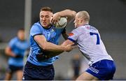 27 January 2024; Paddy Small of Dublin in action against Kevin Loughran of Monaghan during the Allianz Football League Division 1 match between Dublin and Monaghan at Croke Park in Dublin. Photo by Seb Daly/Sportsfile