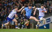 27 January 2024; Lee Gannon of Dublin in action against Monaghan players Michael Hamill, left, and Karl O'Connor during the Allianz Football League Division 1 match between Dublin and Monaghan at Croke Park in Dublin. Photo by Seb Daly/Sportsfile