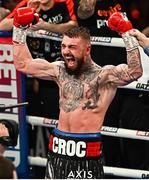 27 January 2024; Lewis Crocker celebrates defeating Jose Felix during their WBO Inter-Continental welterweight bout at Ulster Hall in Belfast. Photo by Ramsey Cardy/Sportsfile