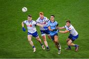 27 January 2024; Lorcan O'Dell of Dublin in action against Monaghan players, Micheál Bannigan, 11, Ryan O’Toole and Joel Wilson, right, during the Allianz Football League Division 1 match between Dublin and Monaghan at Croke Park in Dublin. Photo by Ray McManus/Sportsfile