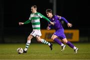 27 January 2024; Sean Kavanagh of Shamrock Rovers and Aaron Dobbs of Wexford during the pre-season friendly match between Shamrock Rovers and Wexford at Roadstone Group Sports Club in Dublin. Photo by Stephen McCarthy/Sportsfile